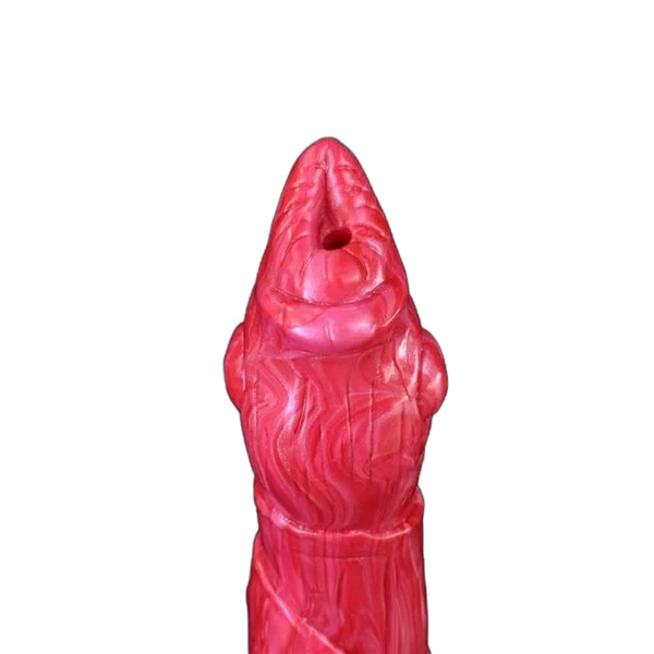 Primo piano punta dildo silicone rosso apertura centrale texture scaglie dettagliati