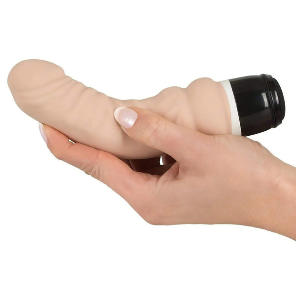 Vibratore pene silicone rosa carne compatto maneggevole in mano donna