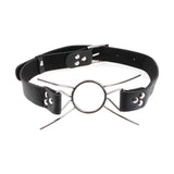 Vista frontale bavaglio BDSM Spider Gag nero con anello centrale e bracci metallici