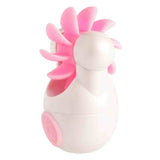 Massaggero orale Sqweel Go vista laterale base bianca e petali rosa