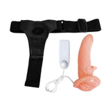 Componenti separati cintura T nera, dildo rosa e telecomando bianco