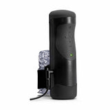 Lato destro masturbatore elettrico The Handy con cavo alimentazione e pannello comandi verde acceso