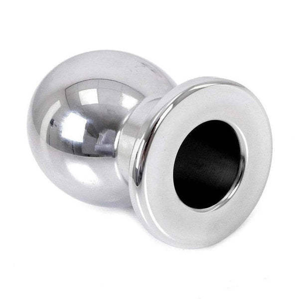 Dettaglio ravvicinato plug anale in metallo con bordo interno nero