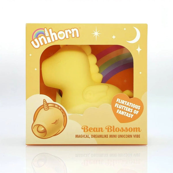 Confezione frontale vibratore clitorideo Unihorn Bean Blossom unicorno giallo con logo e grafica magica