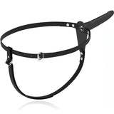 Vista frontale strapon nero Vibrating Penetrix con fibbia centrale e dettagli metallici