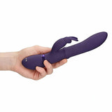 Vibratore rabbit viola VIVE HALO tenuto in mano per mostrare dimensioni reali