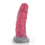 Dildo fantasy rosa intenso con base grigia texture roccia