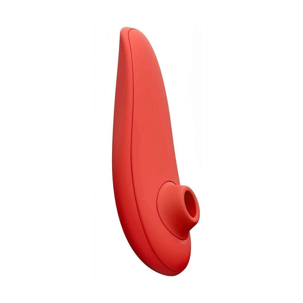 Stimolatore clitoride Womanizer rosso vivo profilo ergonomico liscio
