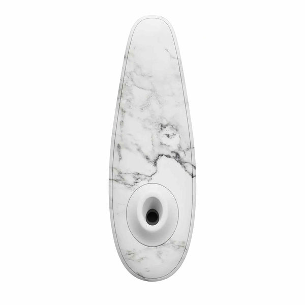 Vista frontale testina stimolazione Womanizer bianco marmo design ergonomico