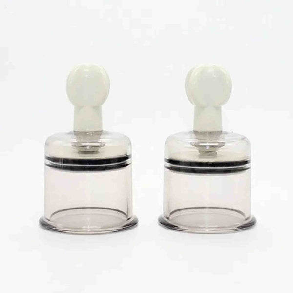 Stimolatore capezzoli twister trasparente con manico bianco opaco